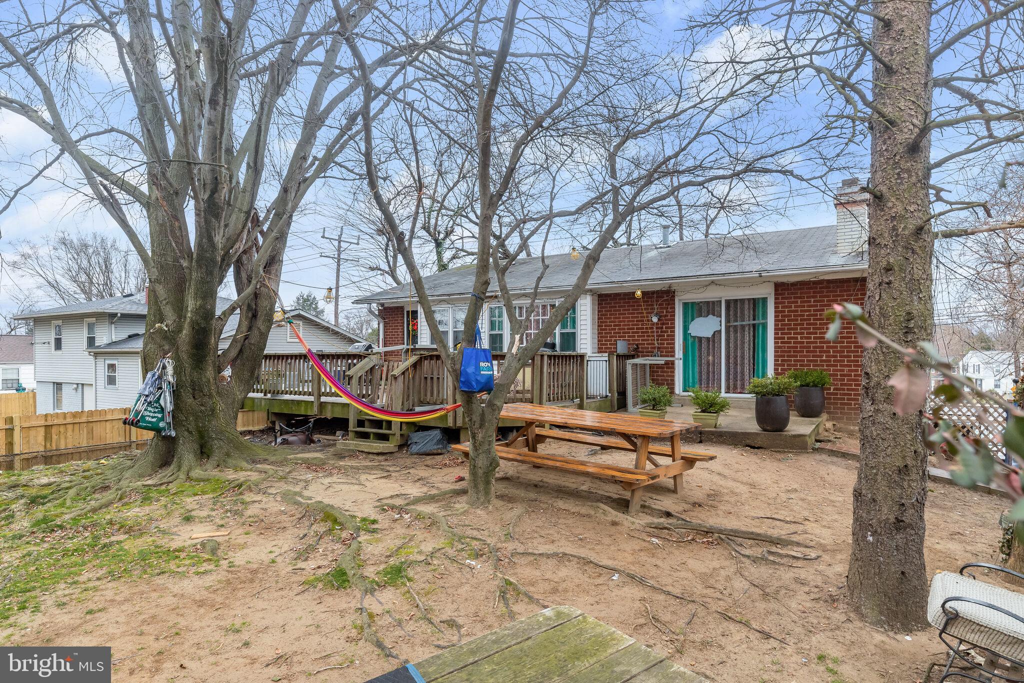 320 University Boulevard East Silver Spring, MD 20901 - Photo 19 of 24 Fenced Backyard | Deck