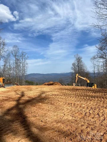 a view of ocean with large building