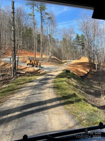 a view of a yard with an outdoor space