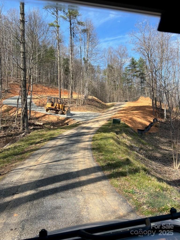 44 Bee Gum Ridge, Unit 44 Bryson City, NC 28713 - Photo 5 of 12 a view of a yard with an outdoor space