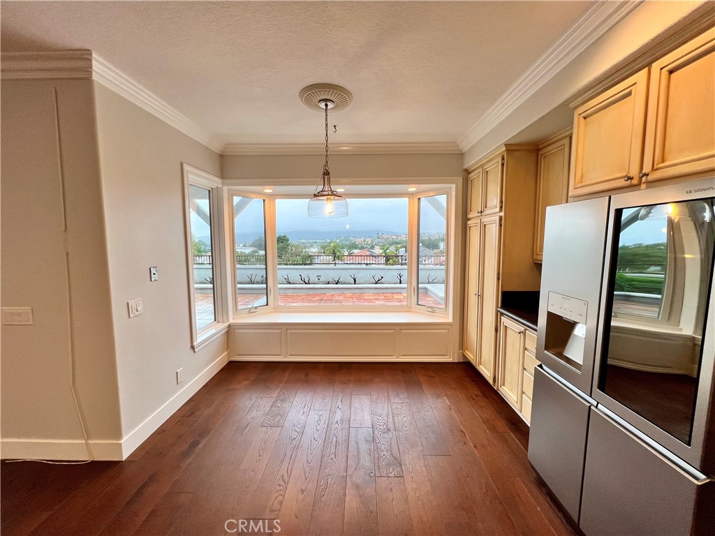 15 Larkfield Lane Laguna Niguel, CA 92677 - Photo 12 of 55 a view of hallway with wooden floor and window