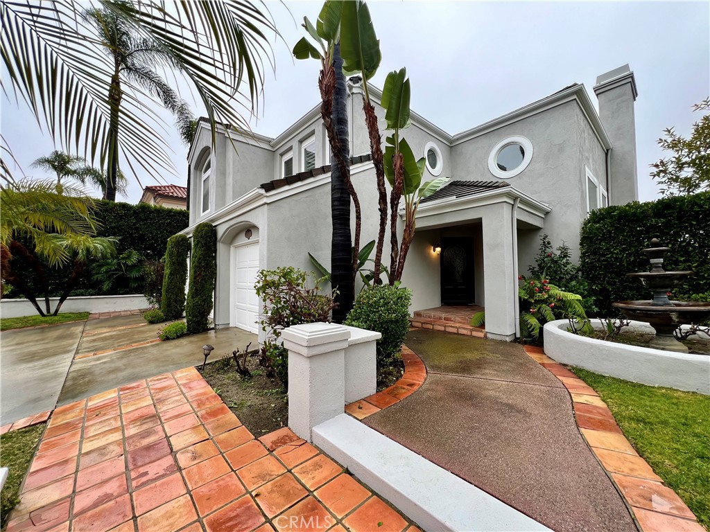 15 Larkfield Lane Laguna Niguel, CA 92677 - Photo 2 of 55 a view of a patio with couches table and chairs with potted plants