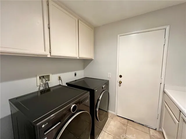 a bathroom with a sink vanity and mirror