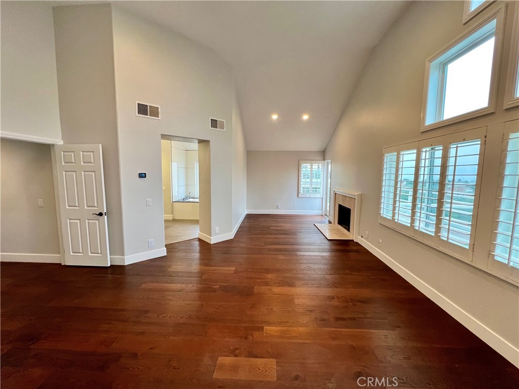 15 Larkfield Lane Laguna Niguel, CA 92677 - Photo 39 of 55 a view of an empty room with wooden floor and a window