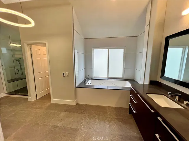 a view of balcony with furniture