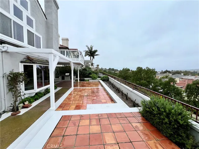 a view of swimming pool with outdoor seating