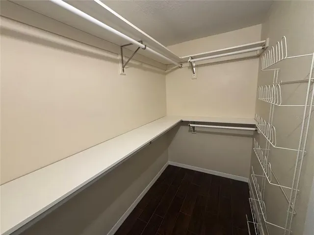 a view of an empty walk in closet