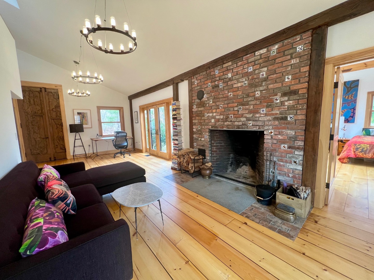50 Bradley Martin Road West Tisbury, MA 02568 - Photo 13 of 37 a living room with furniture and a fireplace