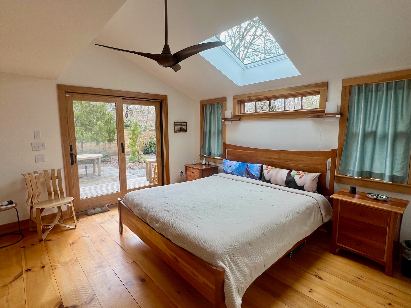 50 Bradley Martin Road West Tisbury, MA 02568 - Photo 15 of 37 a bedroom with a large bed and a window