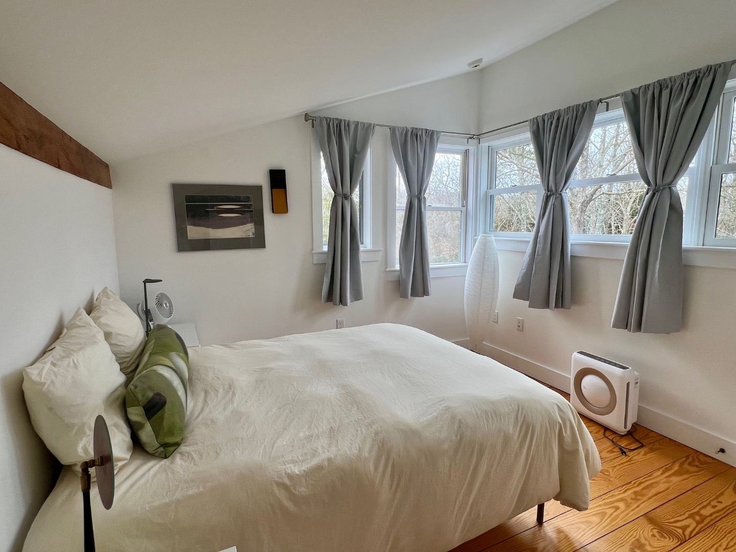 50 Bradley Martin Road West Tisbury, MA 02568 - Photo 21 of 37 a bedroom with a bed and dresser with mirror