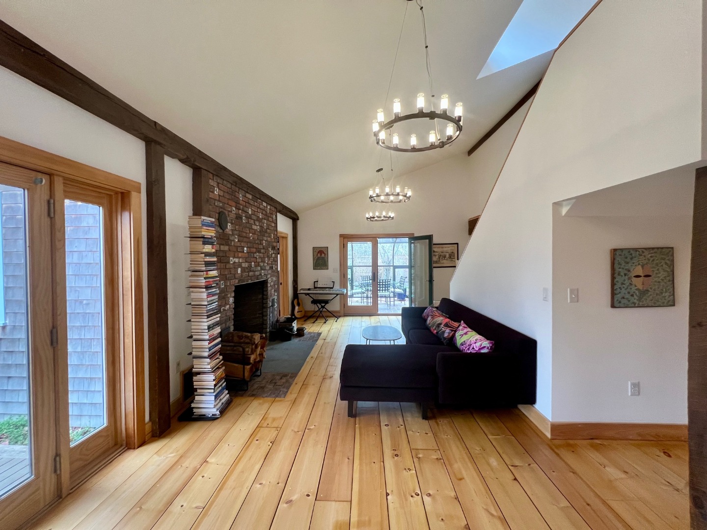 50 Bradley Martin Road West Tisbury, MA 02568 - Photo 6 of 37 a living room with furniture and a fireplace