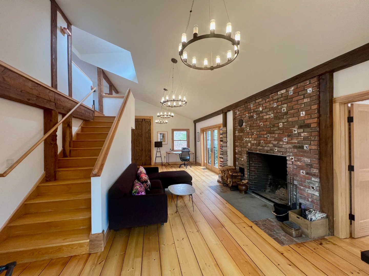 50 Bradley Martin Road West Tisbury, MA 02568 - Photo 7 of 37 a living room with furniture and a fireplace