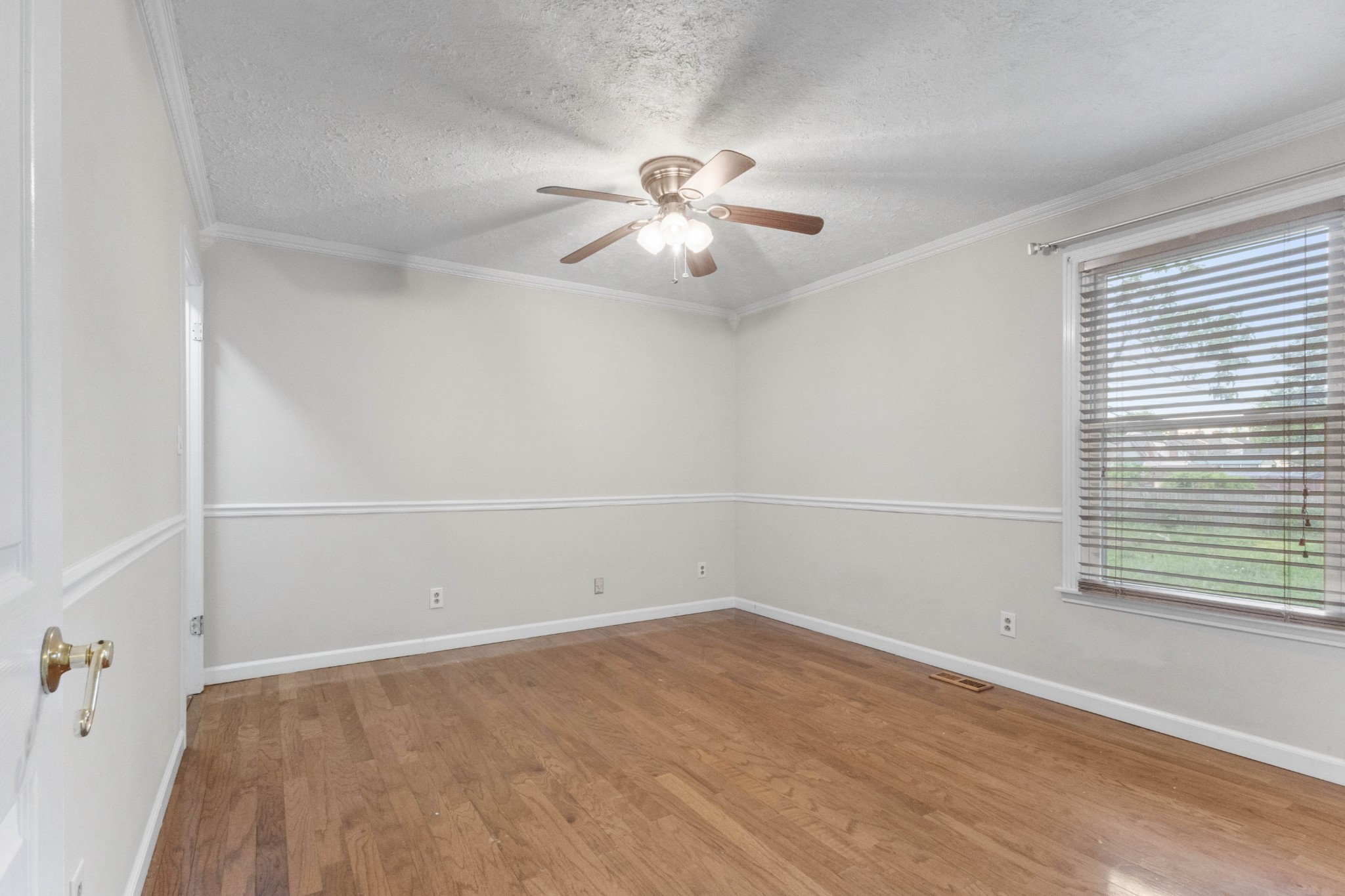 511 Sango Road Clarksville, TN 37043 - Photo 14 of 22 an empty room with a window and a fan