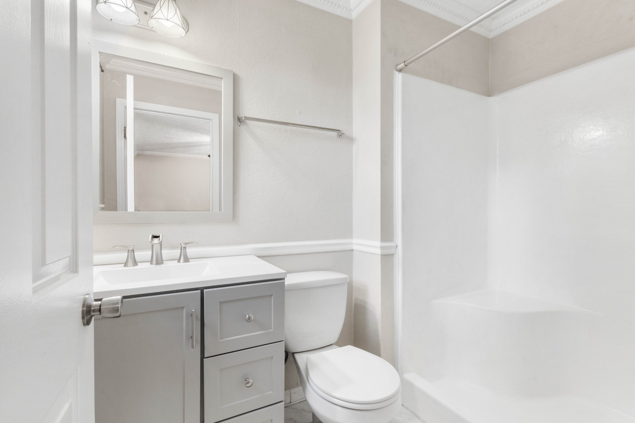 511 Sango Road Clarksville, TN 37043 - Photo 15 of 22 a bathroom with a toilet sink vanity and mirror