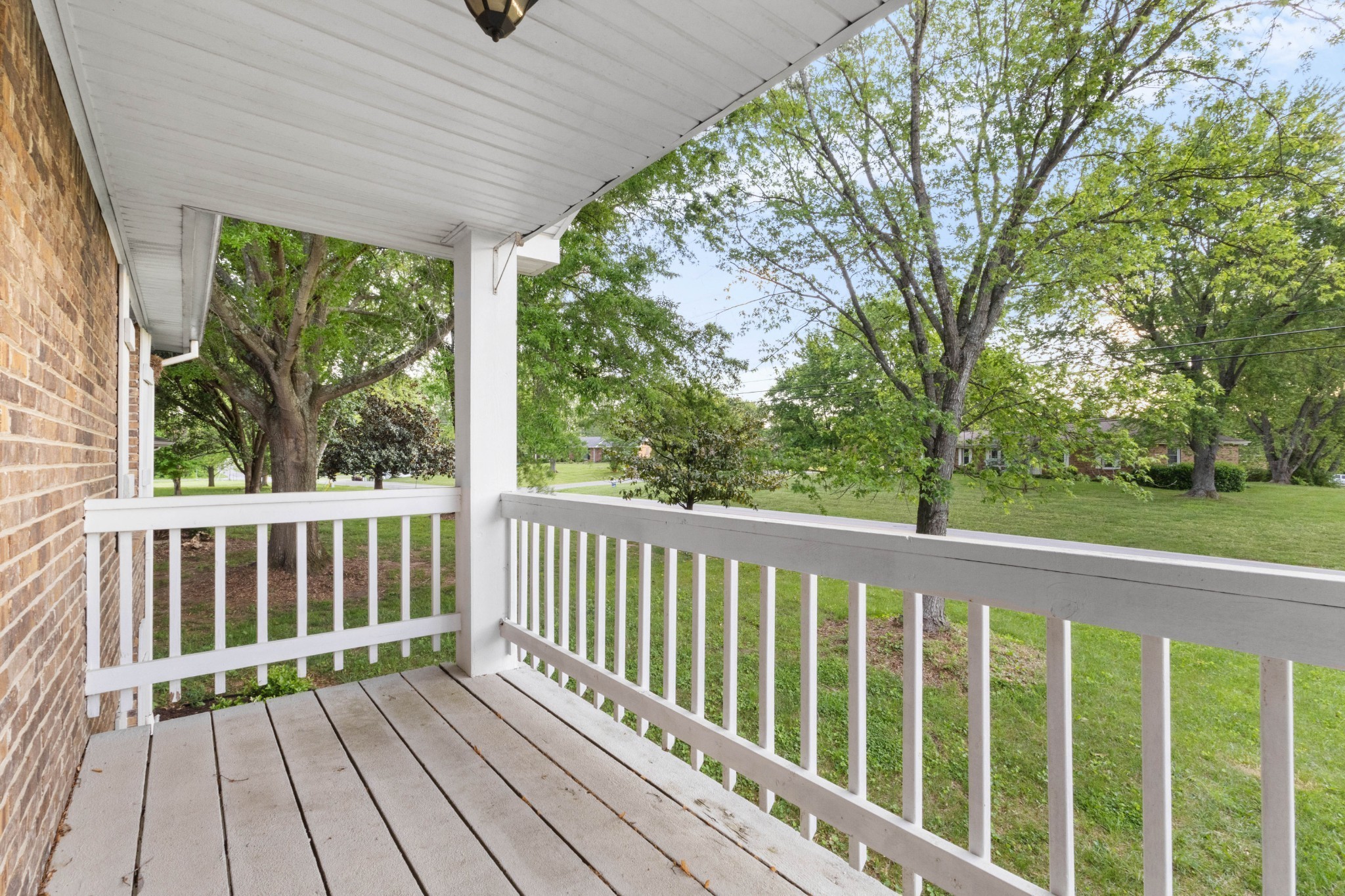 511 Sango Road Clarksville, TN 37043 - Photo 18 of 22 a view of balcony with wooden floor and fence