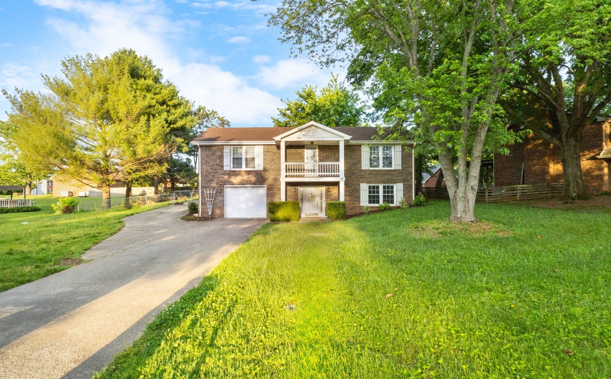 511 Sango Road Clarksville, TN 37043 - Photo 22 of 22 a front view of a house with a garden