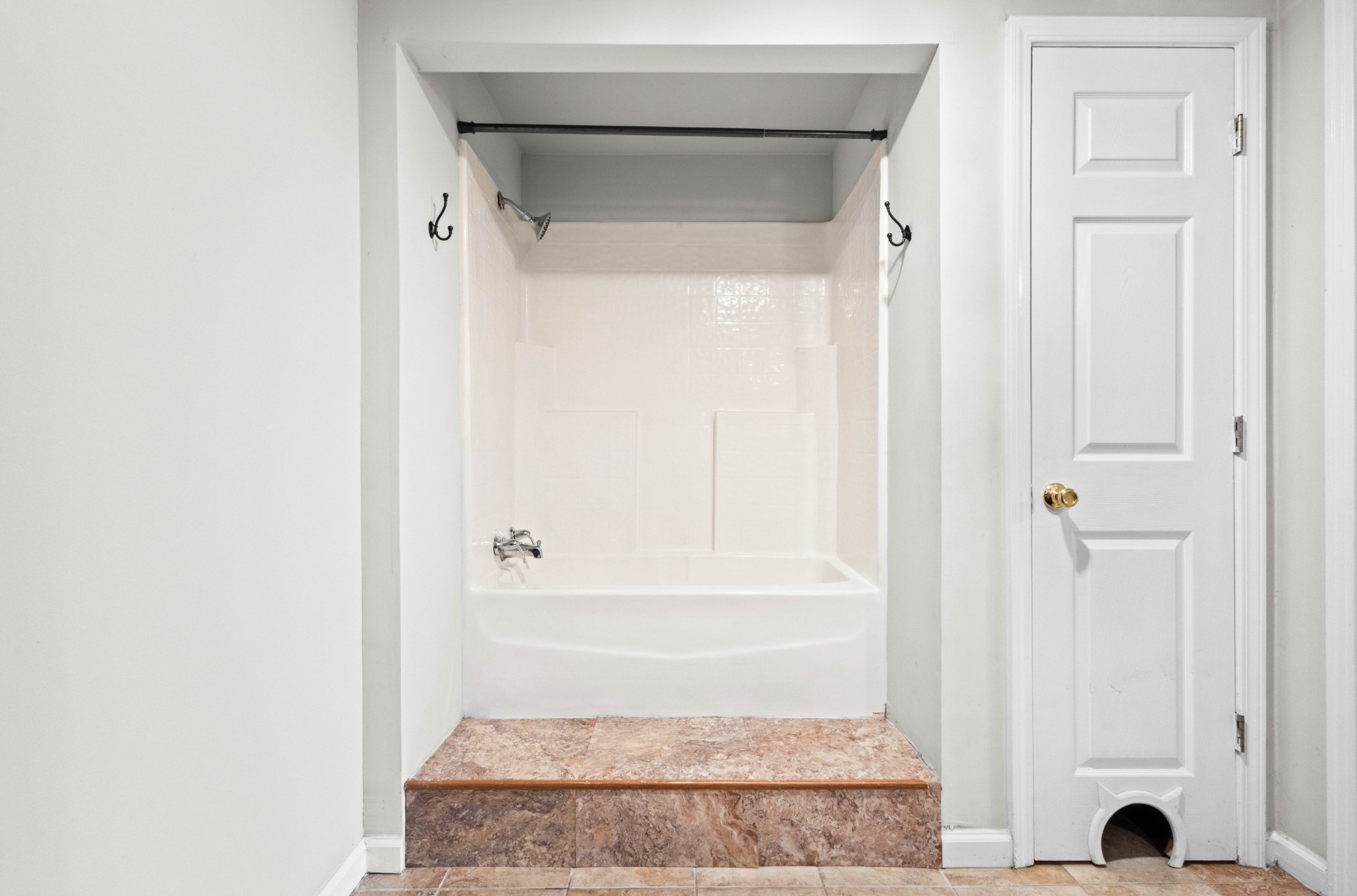 511 Sango Road Clarksville, TN 37043 - Photo 6 of 22 a bathroom with a glass shower door