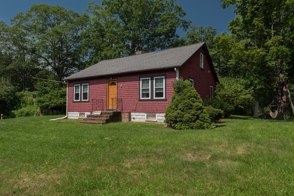 90 Anawan Street Rehoboth, MA 02769 - Photo 1 of 24 a backyard of a house with green space