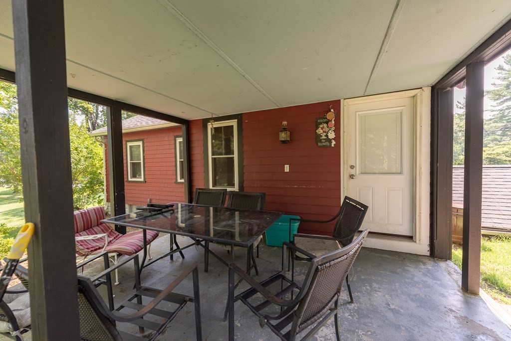 90 Anawan Street Rehoboth, MA 02769 - Photo 11 of 24 a view of a dining room with furniture and windows