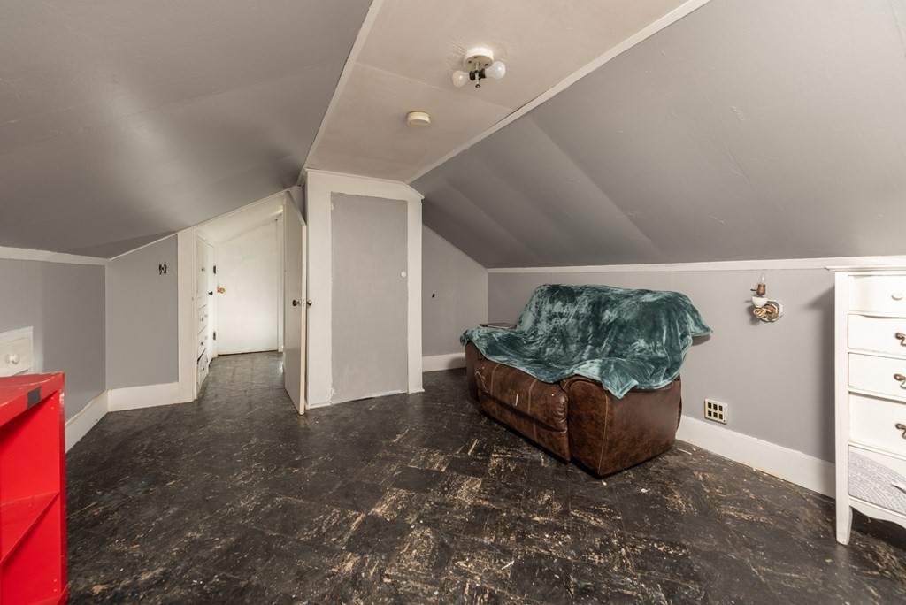 90 Anawan Street Rehoboth, MA 02769 - Photo 17 of 24 a living room with furniture and a table
