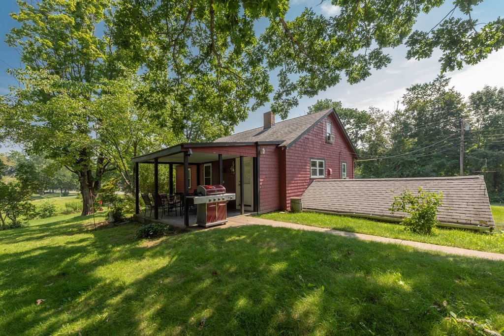90 Anawan Street Rehoboth, MA 02769 - Photo 22 of 24 a view of house with backyard and patio