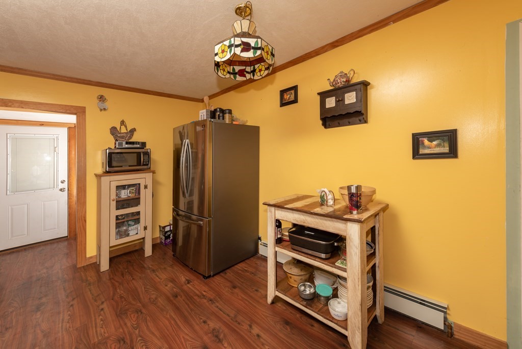 90 Anawan Street Rehoboth, MA 02769 - Photo 7 of 24 a view of a workspace with wooden floor