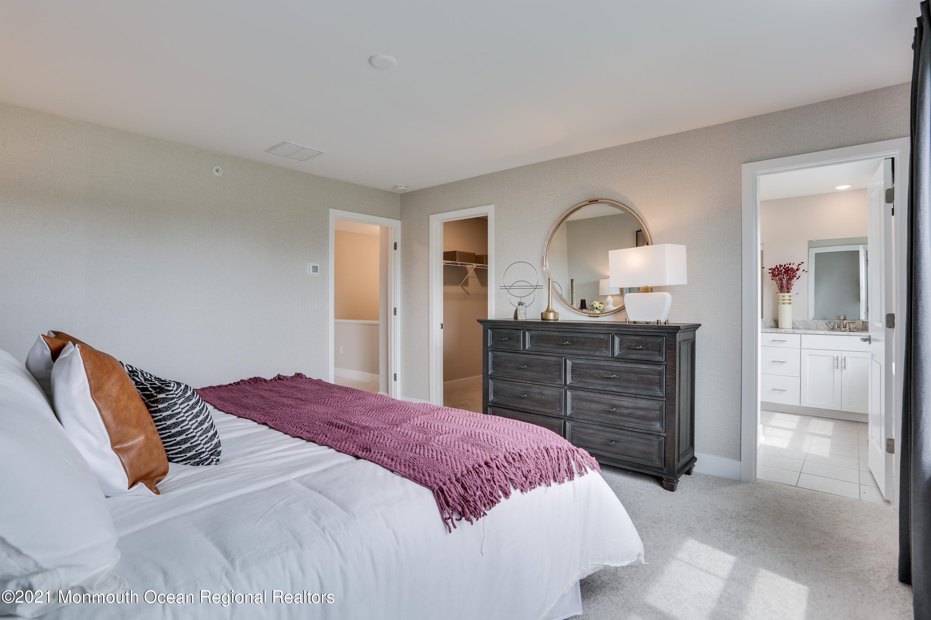 39 Mariveles Way Tinton Falls, NJ 07724 - Photo 13 of 16 a bedroom with a bed and a dresser