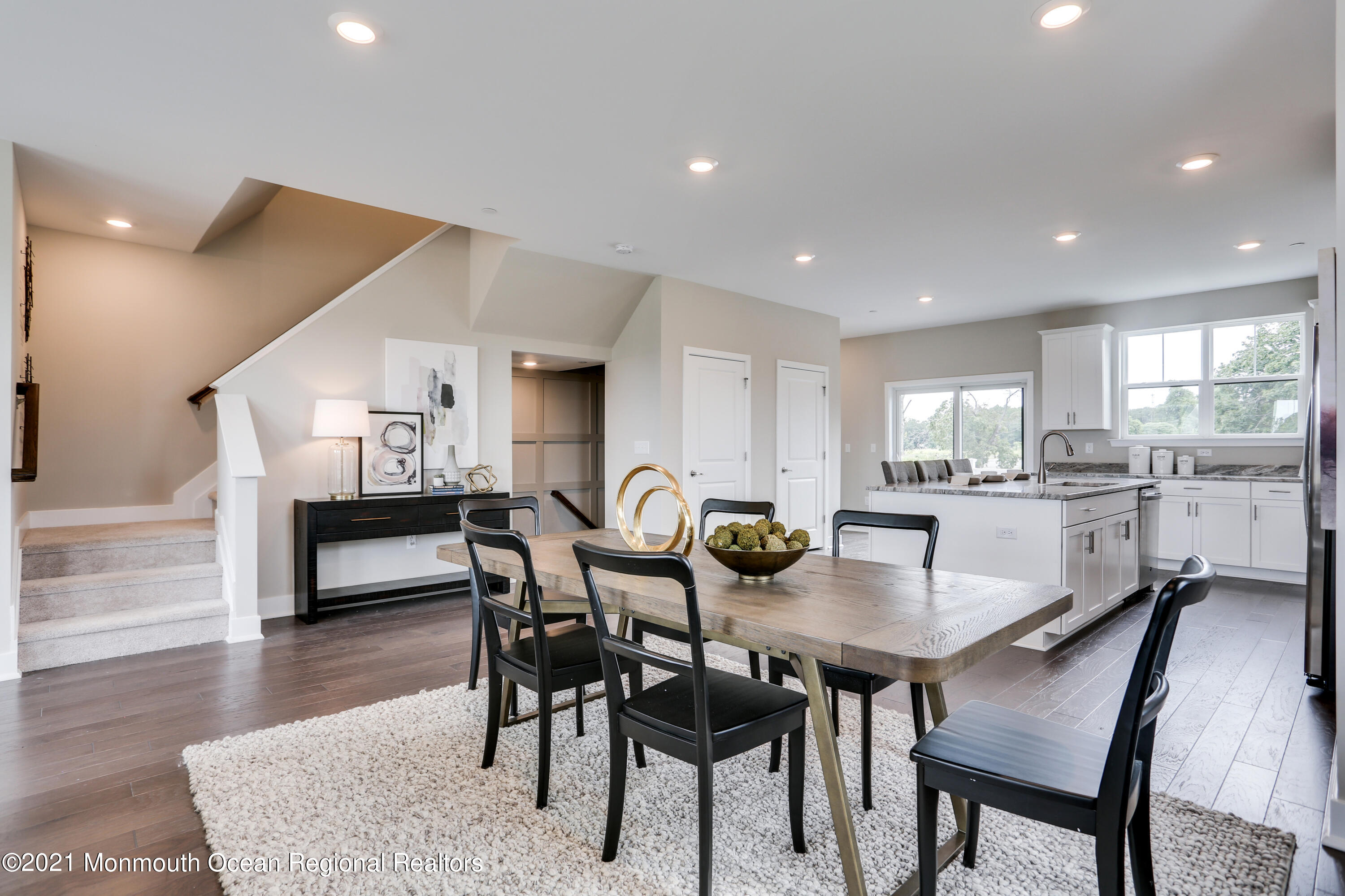 39 Mariveles Way Tinton Falls, NJ 07724 - Photo 14 of 16 a dining room with furniture and wooden floor