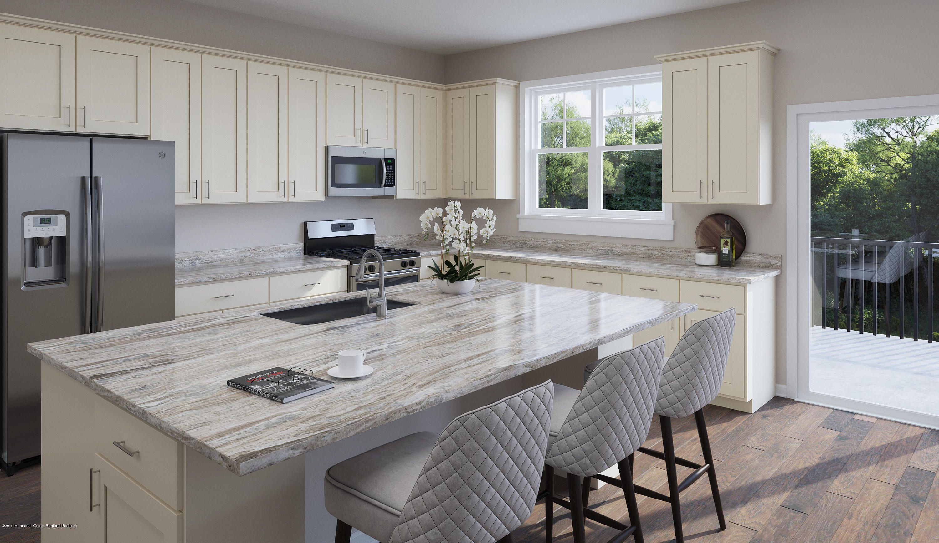 39 Mariveles Way Tinton Falls, NJ 07724 - Photo 2 of 16 a kitchen with a table chairs and refrigerator