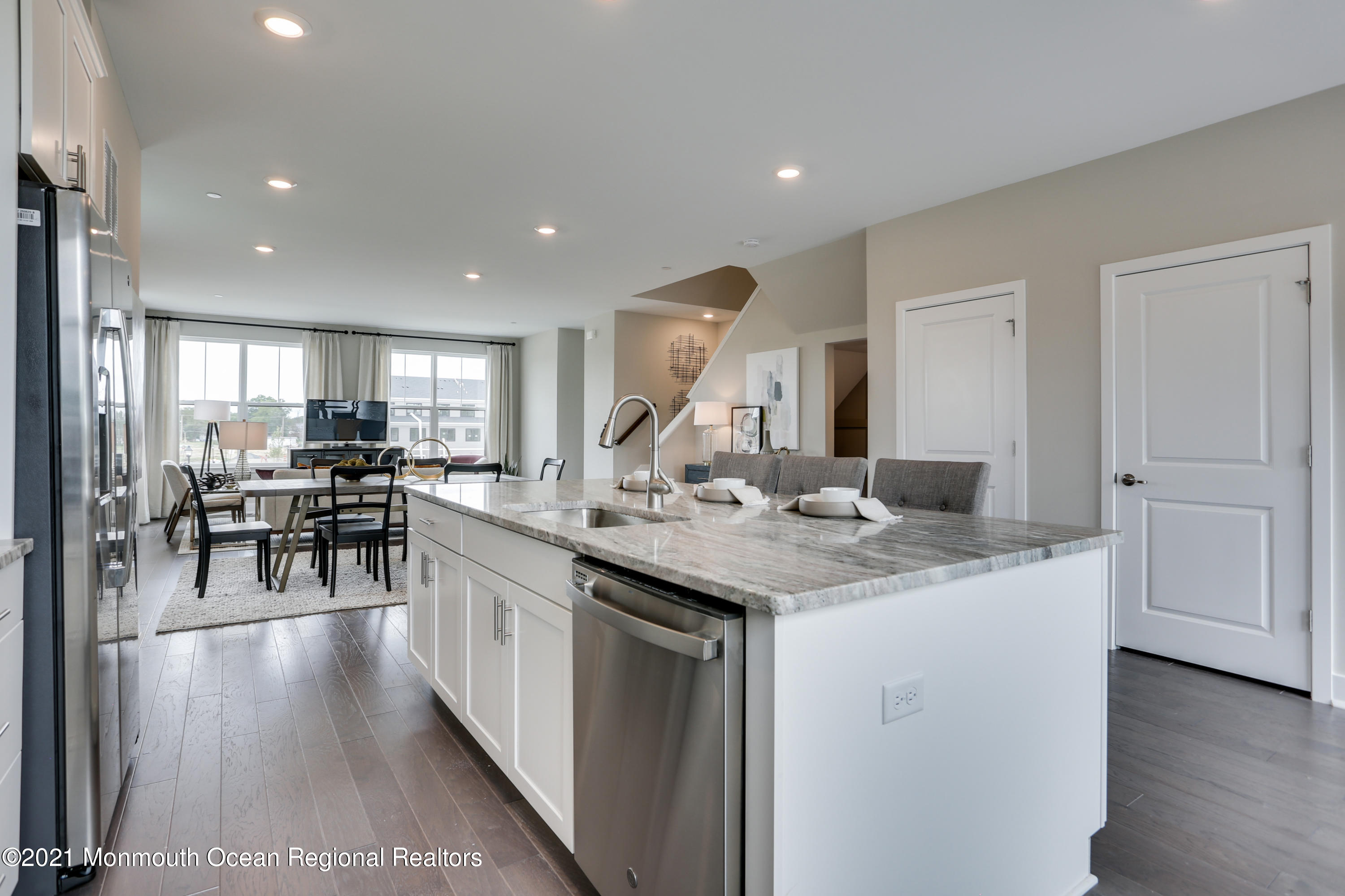 39 Mariveles Way Tinton Falls, NJ 07724 - Photo 8 of 16 a kitchen with counter top space sink and center island