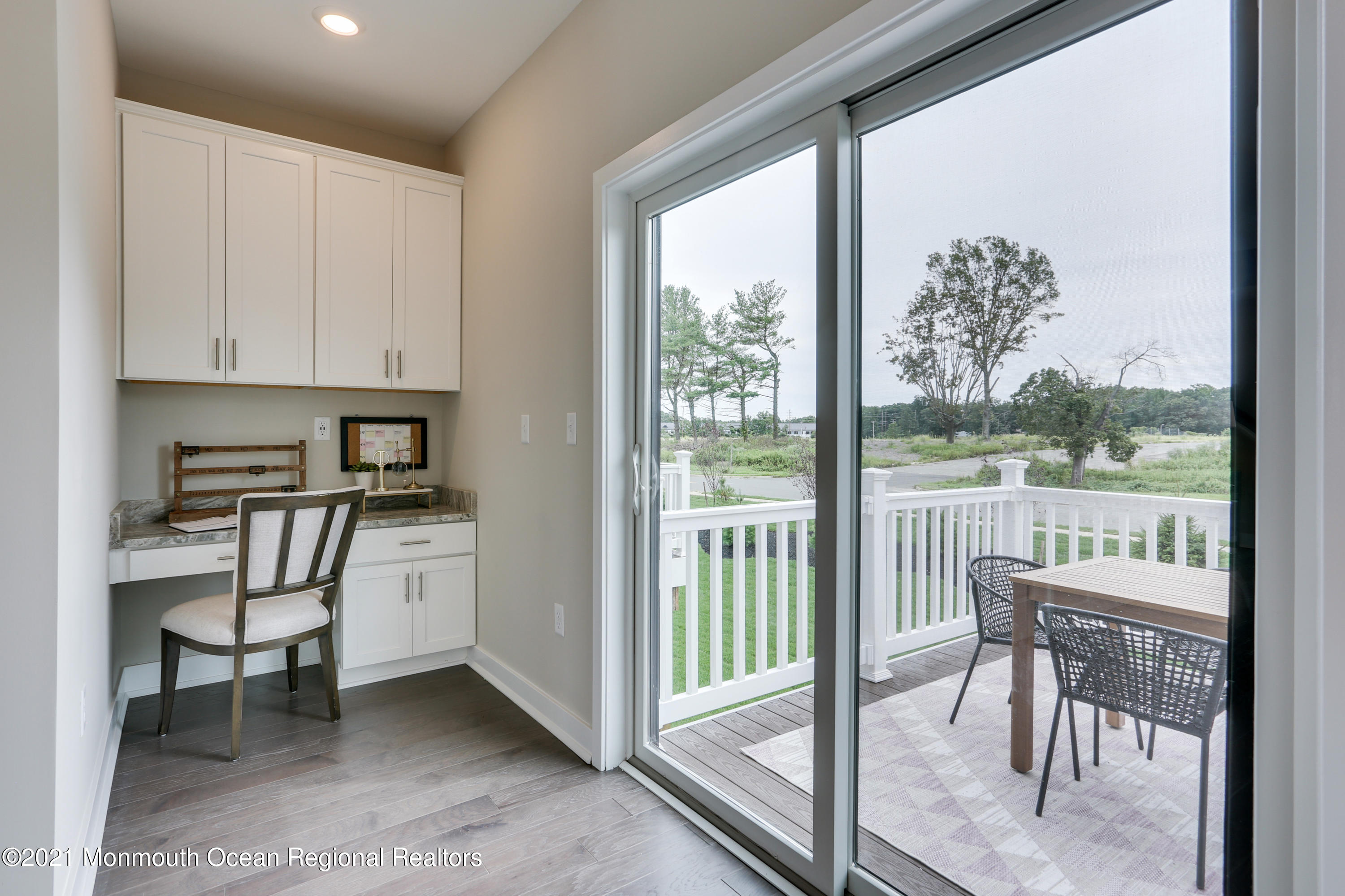 39 Mariveles Way Tinton Falls, NJ 07724 - Photo 10 of 16 a view of a room with a dining table and a chair