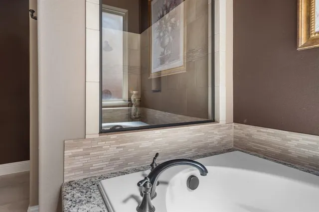 a bathroom with a bathtub