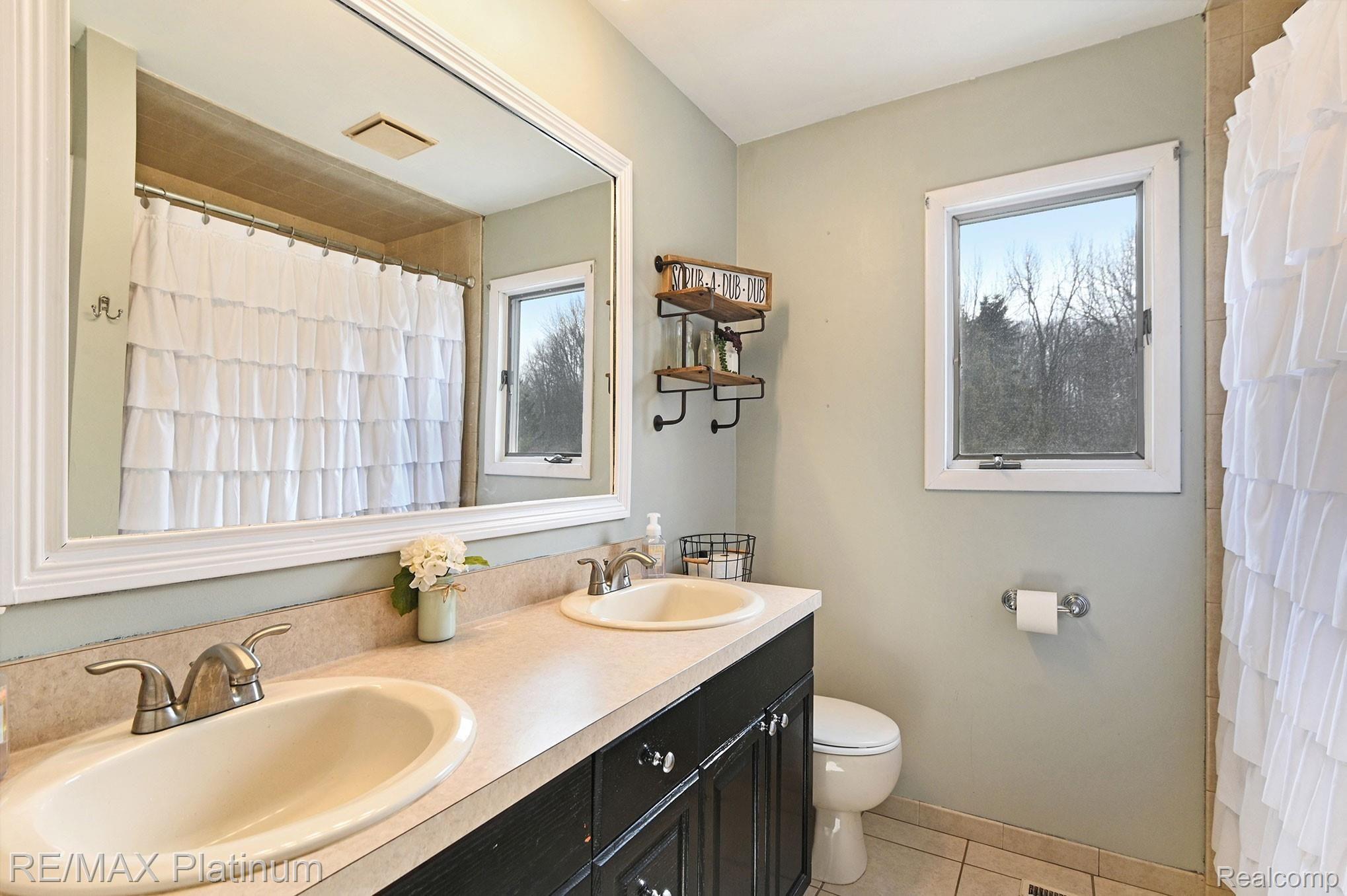 12451 Williams Road Byron, MI 48418 - Photo 10 of 29 First Floor Full Bathroom