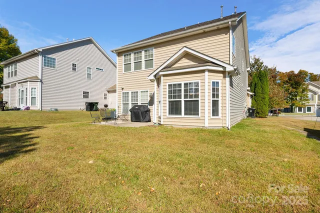 a view of a house with a swimming pool