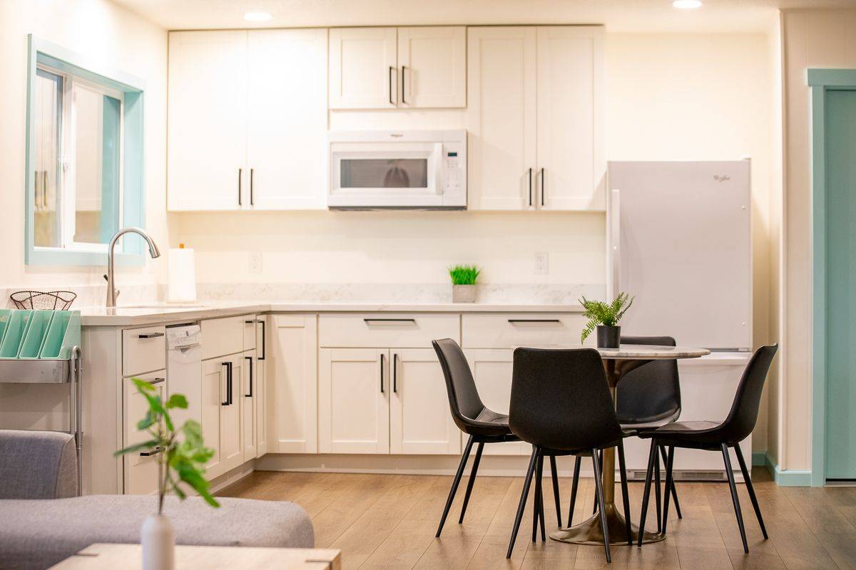 68-1788 Auhili Loop Waikoloa, HI 96738 - Photo 12 of 29 a view of kitchen with furniture and wooden floor