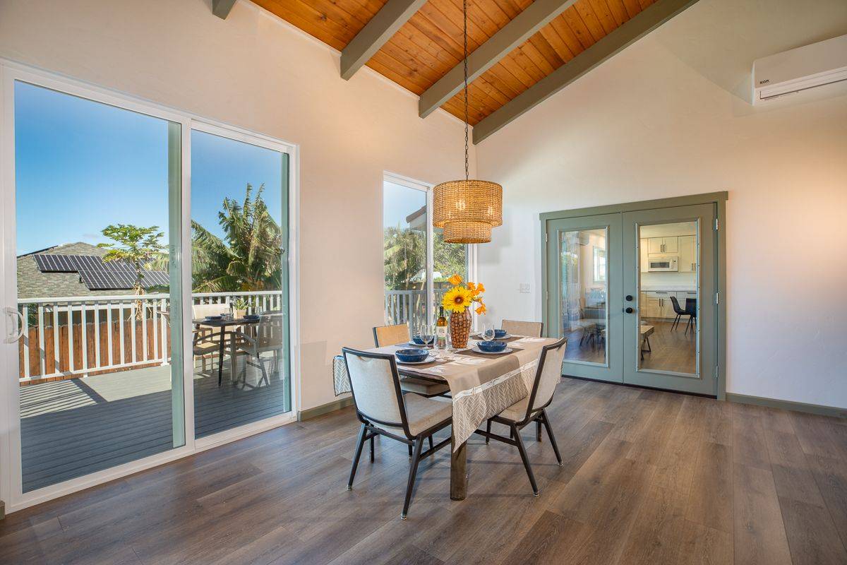 68-1788 Auhili Loop Waikoloa, HI 96738 - Photo 15 of 29 a dining room with furniture and wooden floor