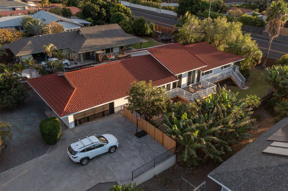 68-1788 Auhili Loop Waikoloa, HI 96738 - Photo 3 of 29 an aerial view of a house with garden space and street view