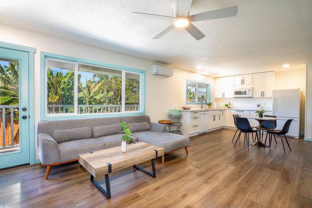 68-1788 Auhili Loop Waikoloa, HI 96738 - Photo 9 of 29 a living room with furniture and a large window