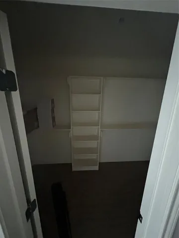 a view of a livingroom and a fireplace