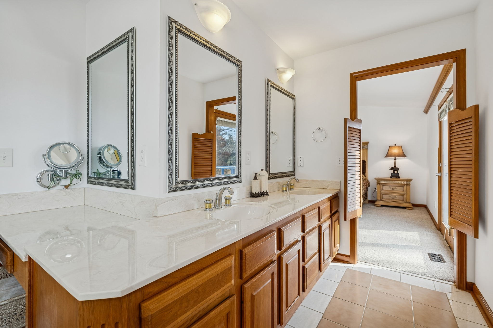 1795 Needmore Road Old Hickory, TN 37138 - Photo 22 of 56 a en suite bathroom with a sink and a mirror