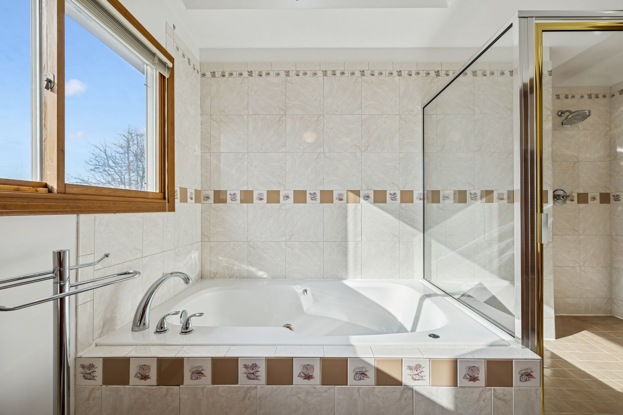 1795 Needmore Road Old Hickory, TN 37138 - Photo 23 of 56 a bathroom with a bathtub and a shower
