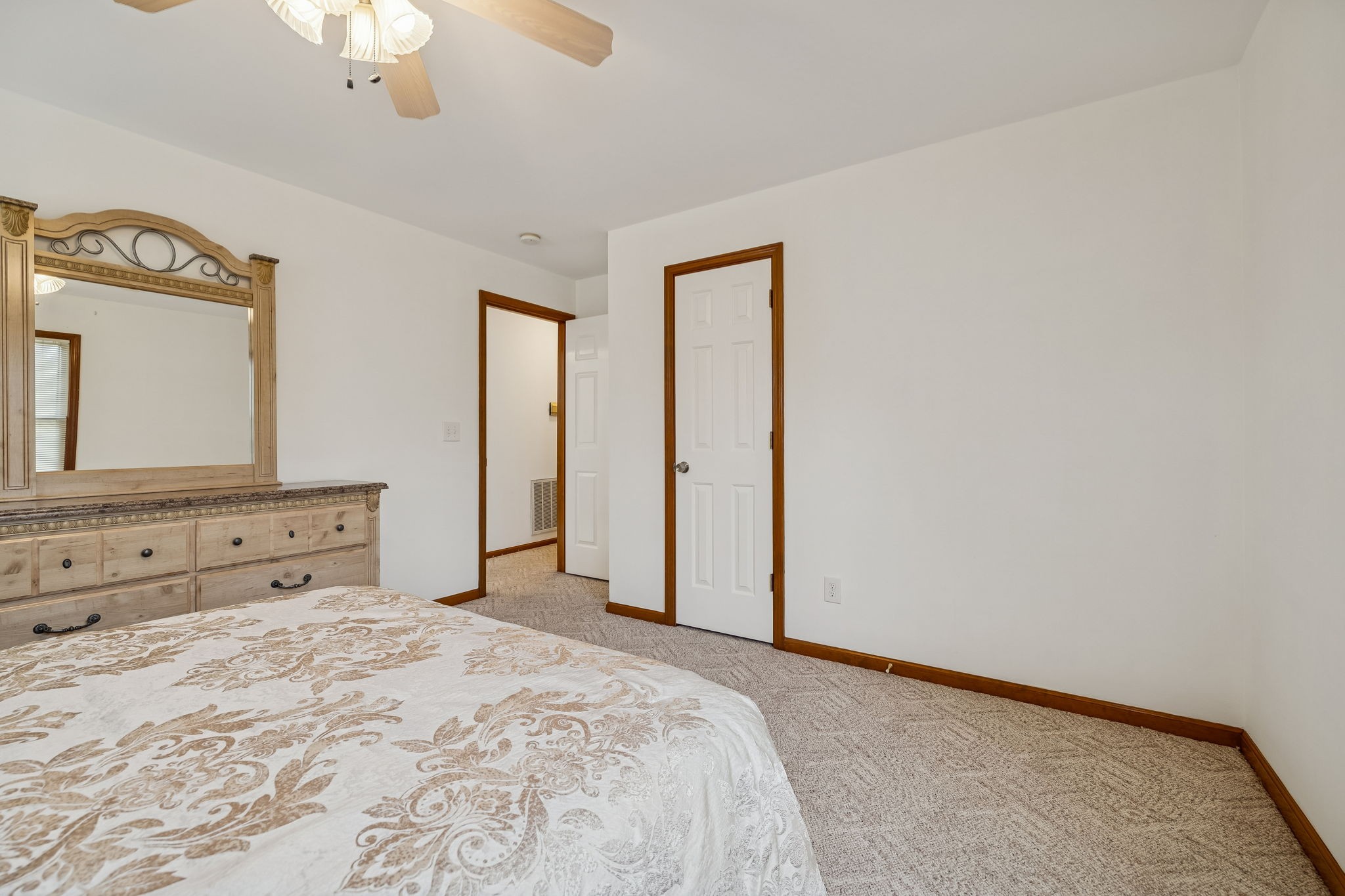 1795 Needmore Road Old Hickory, TN 37138 - Photo 26 of 56 a bedroom with a bed and a mirror
