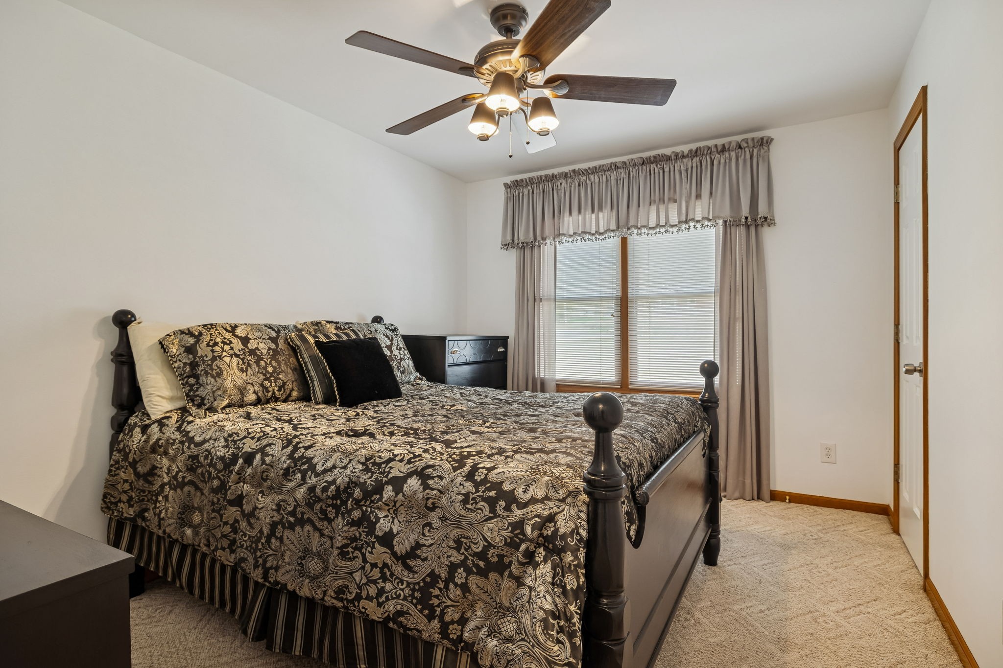 1795 Needmore Road Old Hickory, TN 37138 - Photo 27 of 56 a bed sitting in a bedroom next to a window