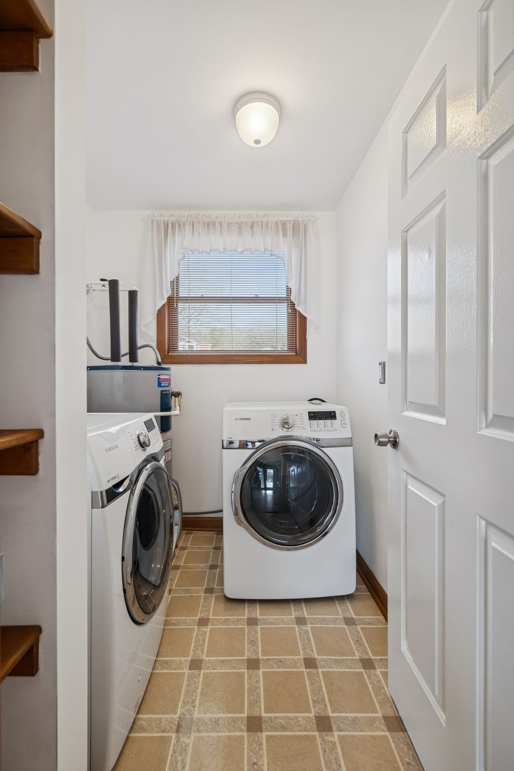 1795 Needmore Road Old Hickory, TN 37138 - Photo 37 of 56 a utility room with sink washer and dryer