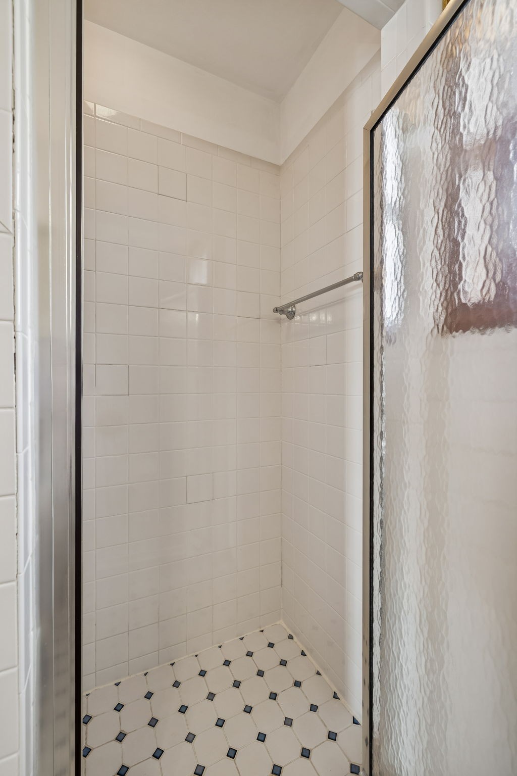 1795 Needmore Road Old Hickory, TN 37138 - Photo 39 of 56 a bathroom with a shower and a glass door