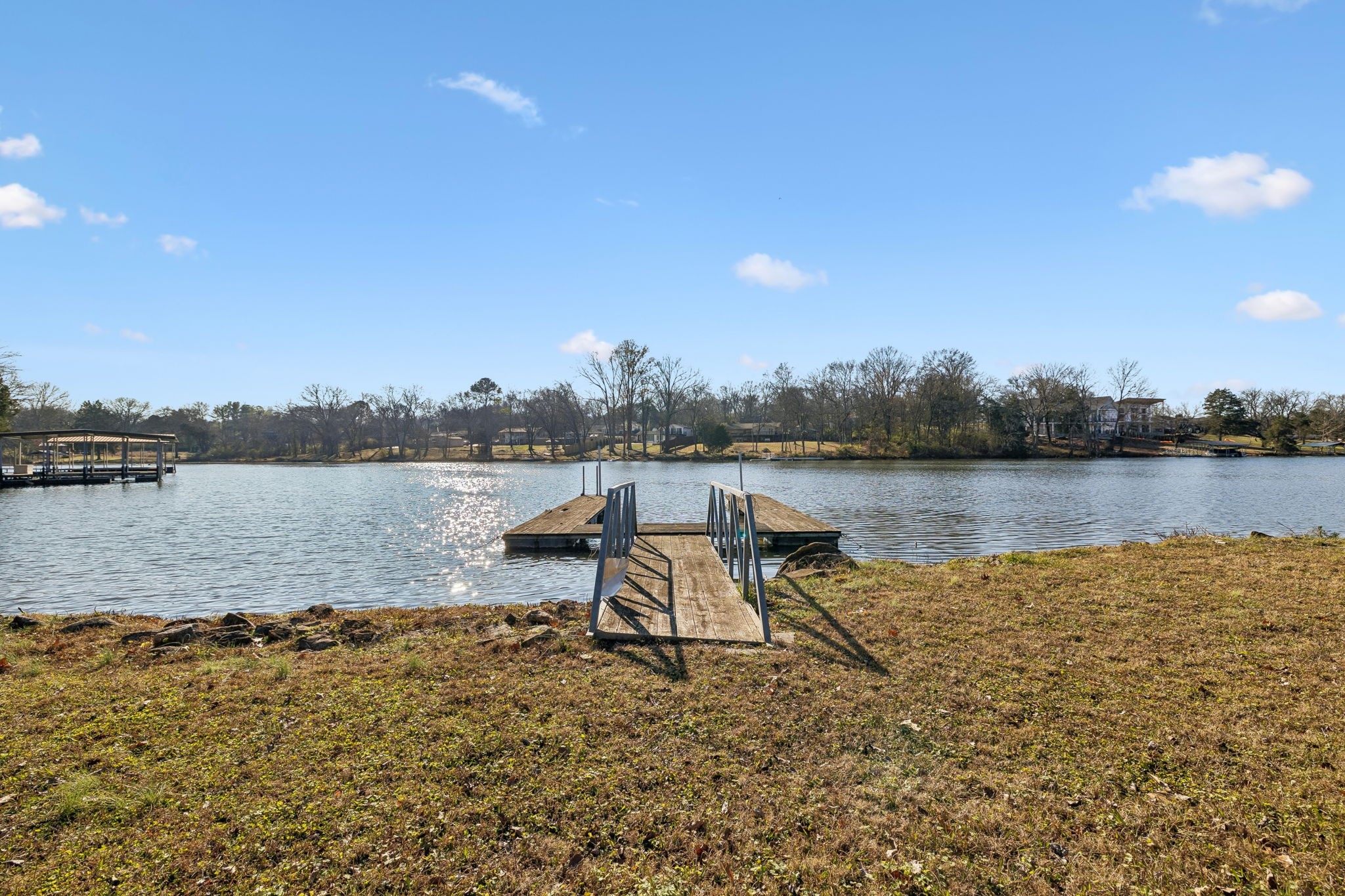 1795 Needmore Road Old Hickory, TN 37138 - Photo 48 of 56 a view of a lake with houses in the background