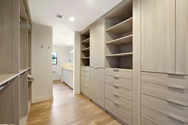 a view of an empty walk in closet