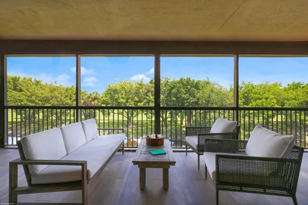 a view of a chairs in the roof deck