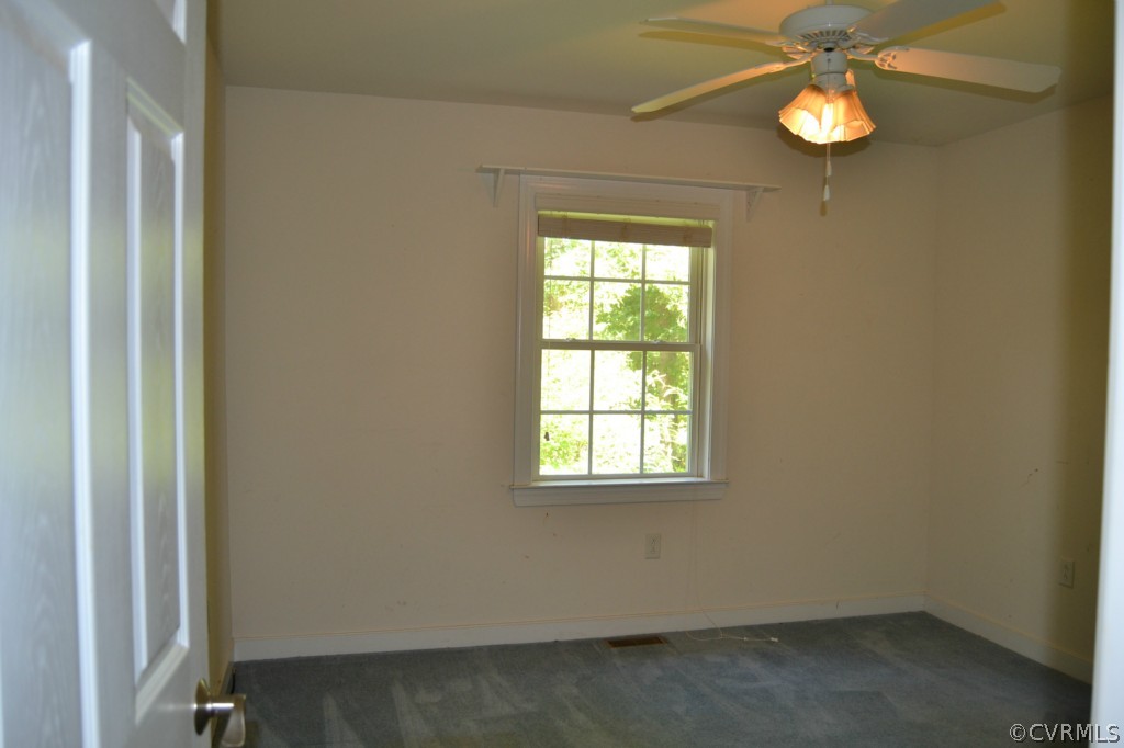 2323 Waltons Store Road Louisa, VA 23093 - Photo 8 of 16 a view of an empty room with a window