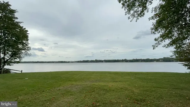 a view of a lake and a yard